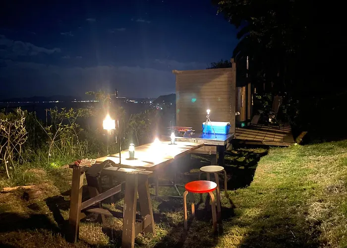 Log Kama Ka-Ma 海を眺めるログハウスで薪サウナにbbqの一棟貸し