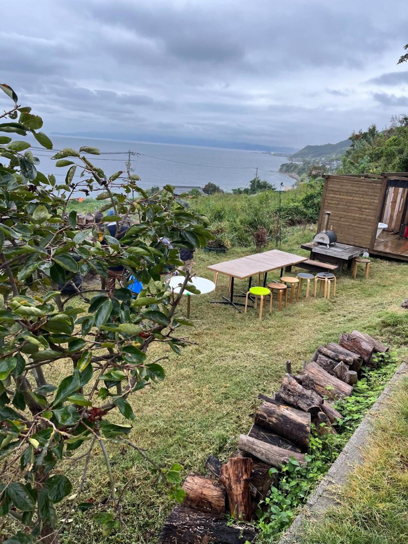 Ferienhaus Log Kama Ka-ma 海を眺めるログハウスで薪サウナにbbqの一棟貸し *